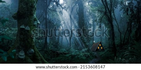 Cabin in the woods with sunbeams Royalty-Free Stock Photo #2153608147