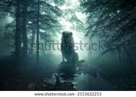 fantasy lion in a misty forest Royalty-Free Stock Photo #2153622253
