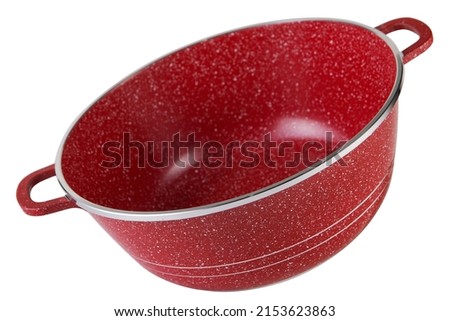 modern new aluminum red pan, tilted as if flying, on a white background, isolate