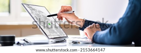 Cadastral Digital Map On Business Laptop Screen Royalty-Free Stock Photo #2153664147