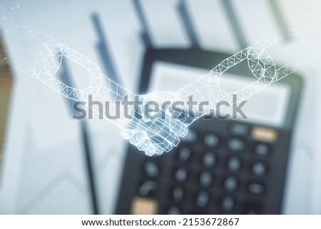 Abstract virtual blockchain technology hologram with handshake on calculator background. Digital money transfers and decentralization concept. Multiexposure