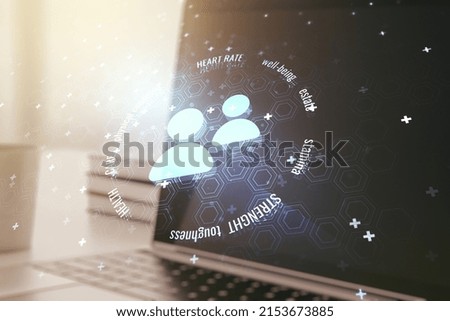 Double exposure of people icons hologram on laptop background. Online insurance service concept
