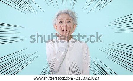Surprised Asian senior woman. Facial expression.