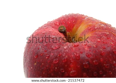 fresh red apple with water drops isolated on white background