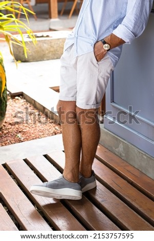 Bright men's cotton shorts, summer men's fashion. Royalty-Free Stock Photo #2153757595