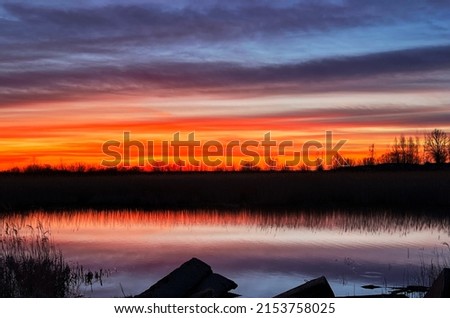 Comfort zone concept. Beautiful colorful shiny sunset on river. High quality photo