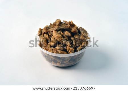 Fried wader fish on a plastic bowl Royalty-Free Stock Photo #2153766697