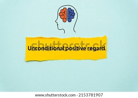 Unconditional positive regard.The word is written on a slip of colored paper. Psychological terms, psychologic words, Spiritual terminology. psychiatric research. Mental Health Buzzwords. Royalty-Free Stock Photo #2153781907