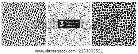 A set of seamless Dalmatian animal fur prints. Animal skin pattern. Stained background. Vector illustration. Random bovine spots hand-drawn. Texture banner with farm animals. Royalty-Free Stock Photo #2153803551
