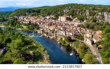 Historical Vogue town, dramatically located in a gorge of Ardeche river, is one of the most beautiful villages of France and a popular travel destination in Ardeche region Royalty-Free Stock Photo #2153857807