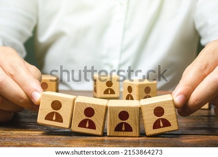 Leader and weak unstable team. Working with human resources. Hiring and recruiting. Recruitment of an effective team. Retraining before being assigned to a new project. Relocation to a new place Royalty-Free Stock Photo #2153864273