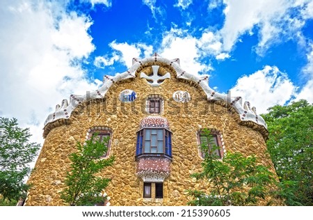 Gatehouse at the main entrance to Park Guell, which were originally designed as The Caretakers House. Barcelona, Spain. Park Guell (1914) is the famous architectural town art designed by Antoni Gaudi