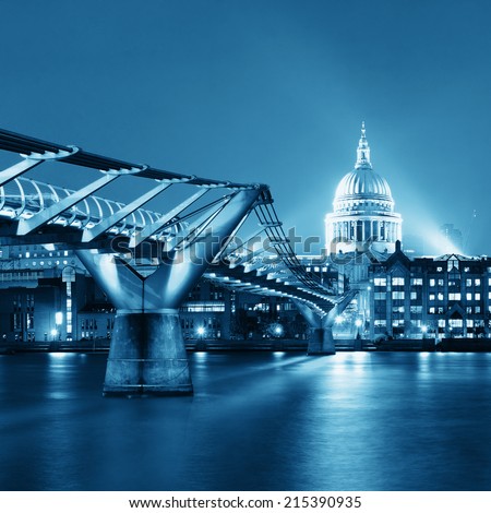 Millennium Bridge and St Pauls Cathedral at night in London