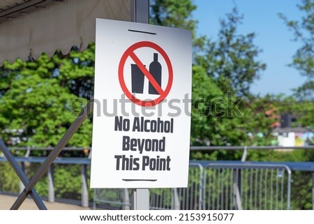 No alcohol beyond this point sign at an entry point to a venue