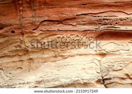 stone background with a pattern similar to Arabic script