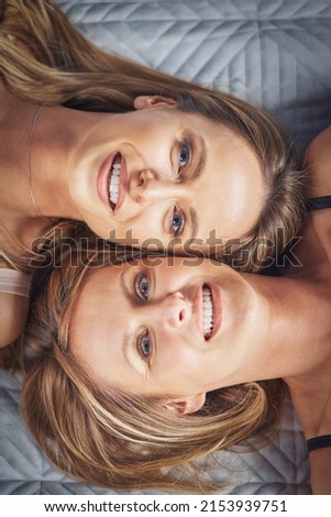 Picture of two girls friends or couple in the bed