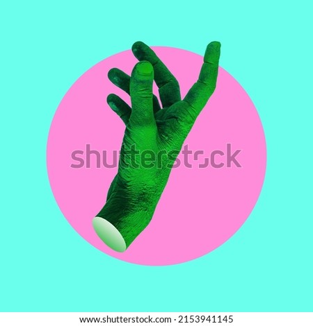 Bright painted green hand in pink circle on blue background. Contemporary art collage.  Royalty-Free Stock Photo #2153941145