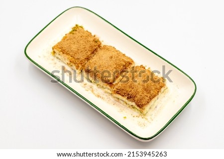 Cold baklava. Baklava with milk isolated on a white background. Mediterranean cuisine delicacies. Close-up. Local name soguk baklava