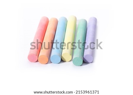 colorful chalk sticks isolated on white background