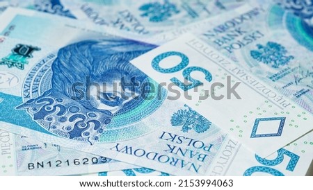 Close-up of zloty banknotes background, Polish currency. The concept of currency exchange in another country. Selective focus