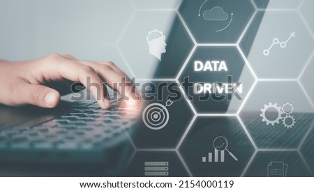 Data driven marketing concept. Data collection icons with Big data analytic message. Marketing technology. Working on computer cubes with data driven. Creative digital development agency. Royalty-Free Stock Photo #2154000119