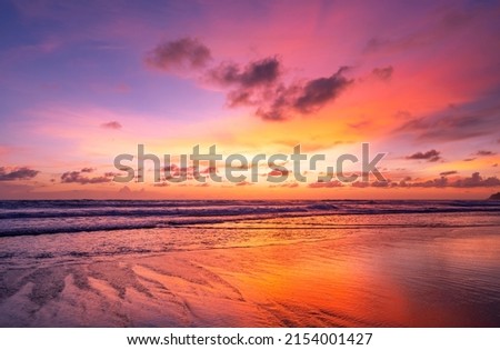 Sunset or sunrise sky clouds over sea sunlight in Phuket Thailand Amazing nature landscape seascape Colorful sunset sky background