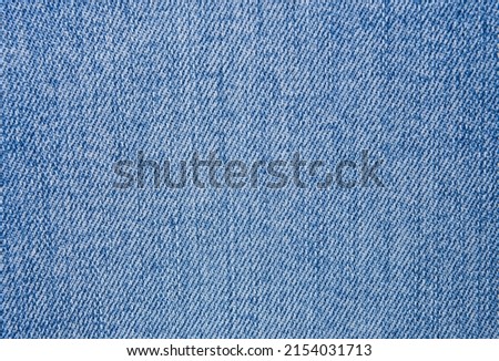 Blue jeans fabric. Denim jeans texture or denim jeans background

 Royalty-Free Stock Photo #2154031713