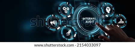 Business, Technology, Internet and network concept. Young businessman working on a virtual screen of the future and sees the inscription: Internal audit Royalty-Free Stock Photo #2154033097