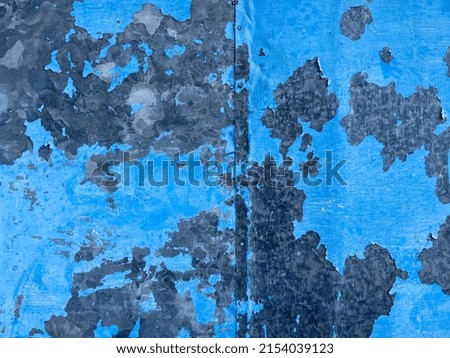 Abstract grungy blue stain  wall background in cold mood. Pantone of the year color concept background with space for text. 