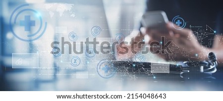 Telemedicine, Medical technology, Digital healthcare, global health network, virtual hospital concept. Doctor working on laptop computer with health link, medical technology icon on virtual screen Royalty-Free Stock Photo #2154048643