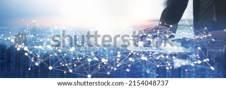 Modern cityscape and communication network concept. Telecommunication. IoT (Internet of Things). ICT (Information communication Technology). Smart city. Digital transformation Royalty-Free Stock Photo #2154048737