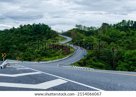 Amazing On a nature trail road with curves similar to No. 3, Nan Province, Thailand, a road with curves with number 3 on Highway 1081, one of Nan's tourist attractions. tourist photography