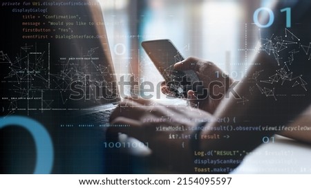 Digital software technology, mobile app development concept. Computer programmer, software developer coding on laptop and using mobile phone with javascript and binary code, agile methodology Royalty-Free Stock Photo #2154095597