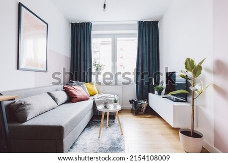 Interior of small apartment living room. Real estate rent and home staging Royalty-Free Stock Photo #2154108009