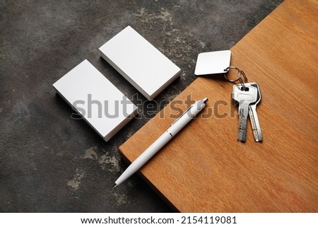 Blank business cards, pen and keys. Template for graphic designers portfolios.