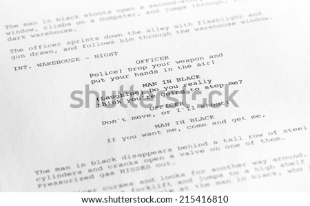 Close-up of a page from a screenplay or script in proper Hollywood format, with generic text written by the photographer to avoid any copyright issues. Royalty-Free Stock Photo #215416810