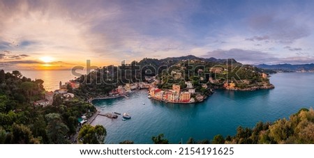Portofino, Italy fishing village and commune in the Metropolitan City of Genova at dusk. Royalty-Free Stock Photo #2154191625
