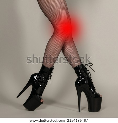 young woman experiencing joint pain