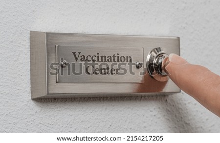 Doorbell sign with the engraving Vaccination Center