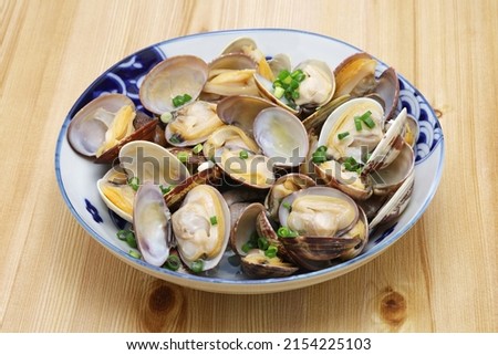 Asari no sakamushi is Japanese asari clams steamed with sake ( rice wine ). Royalty-Free Stock Photo #2154225103