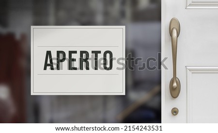 Business message on a door. White sign on glass indicating a shop message. Aperto.