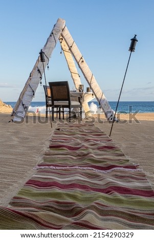 camp tent tipi on the beach with dinning table