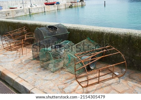 Old fishing cages, some of them without its net and rusty. Abandoned.Tazones, Asturias
