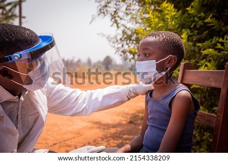  doctor is busy visiting a young child who is about to take a serological test. Royalty-Free Stock Photo #2154338209