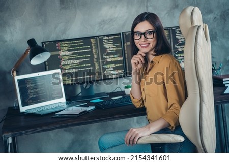 Photo of young charming girl sit desk armchair workplace designer testing data website professional indoors