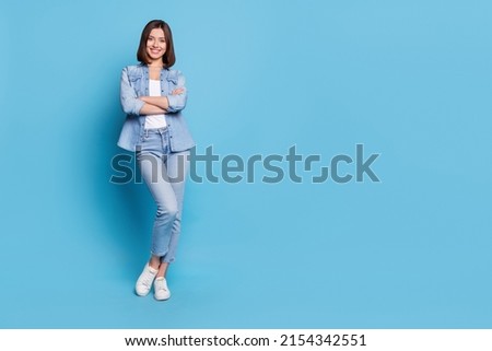 Photo of confident charming woman wear jeans shirt arms crossed smiling isolated blue color background Royalty-Free Stock Photo #2154342551