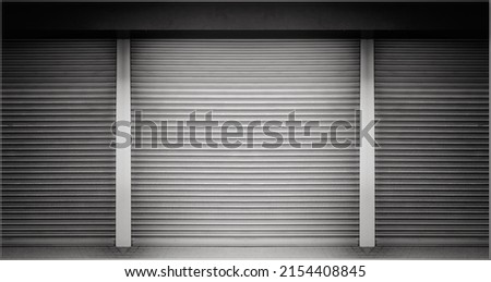 Old weathered and rusty closed steel doors for steel metal store door backgroud and texture. Royalty-Free Stock Photo #2154408845