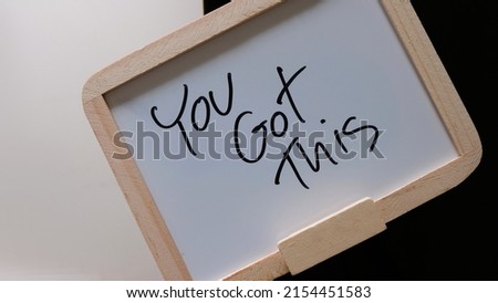 You got this! Handwriting on mini white board. Business concept.