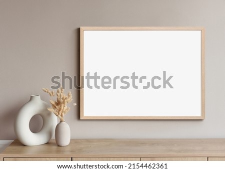 Blank empty picture frame mock-up. Artwork template in interior design Royalty-Free Stock Photo #2154462361
