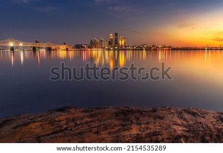 A skyline of illuminated downtown Louisville in Kentucky USA Royalty-Free Stock Photo #2154535289